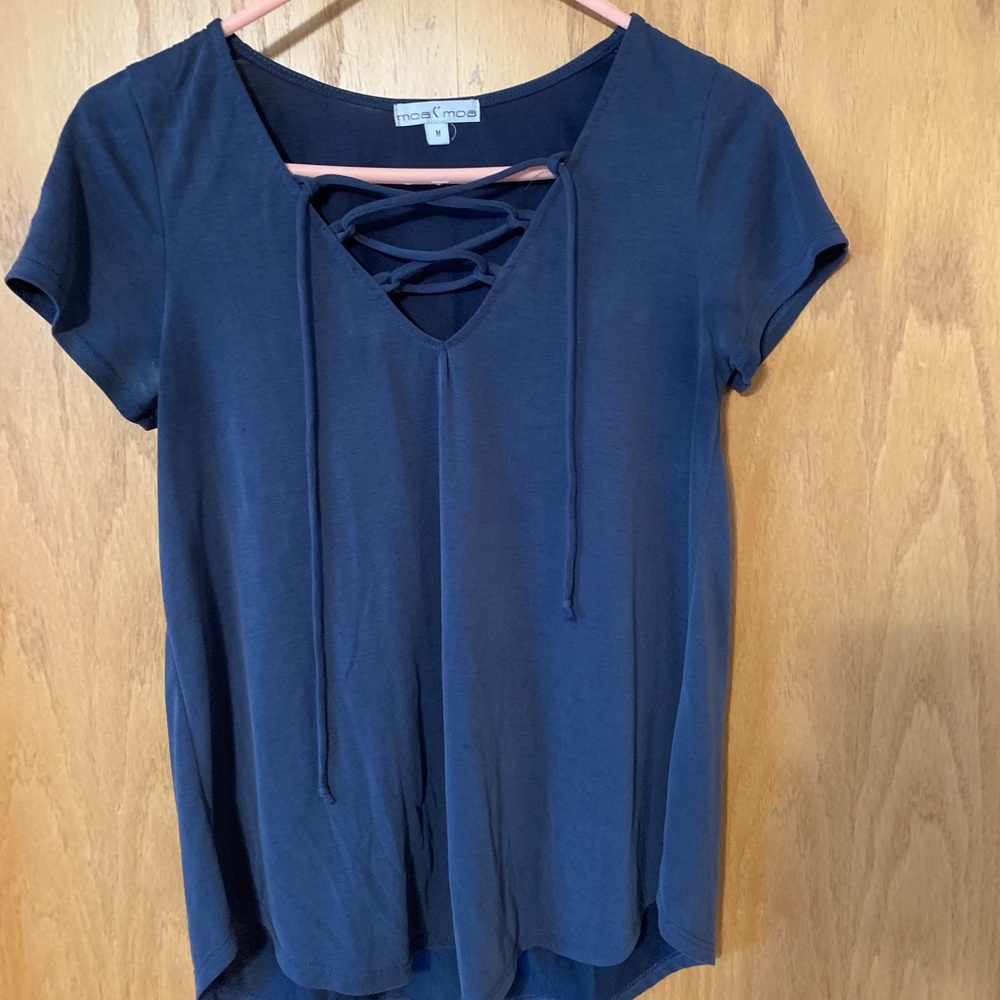 Navy blue t-shirt with lace up neck.